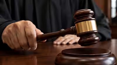 Stationary vehicle does not escape liability if improperly parked; Calcutta High Court enhances compensation for deceased homemaker Stationary vehicle does not escape liability if improperly parked; Calcutta High Court enhances compensation for deceased homemaker