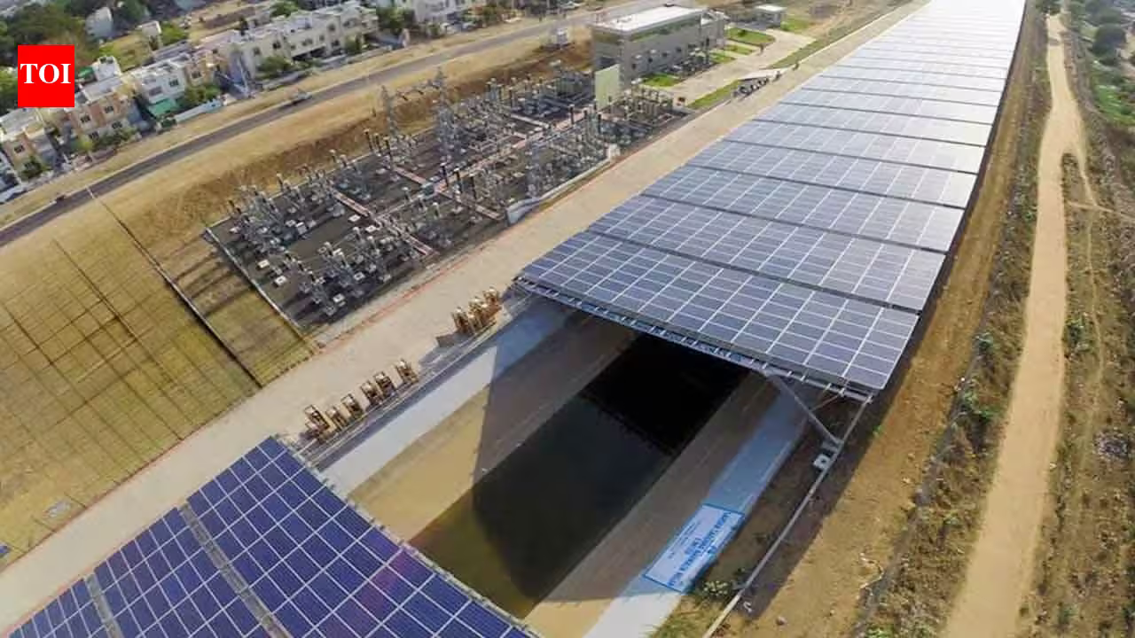 A half-mile solar strip floats above an irrigation canal in Gujarat, generating 1.6 million kilowatt-hours of power while saving 2.38 million gallons of water from evaporation A half-mile solar strip floats above an irrigation canal in Gujarat, generating 1.6 million kilowatt-hours of power while saving 2.38 million gallons of water from evaporation