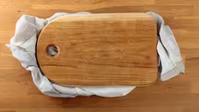 Cutting Board Safety: Put a towel under your cutting board: The tiny kitchen trick that makes chopping safer Cutting Board Safety: Put a towel under your cutting board: The tiny kitchen trick that makes chopping safer