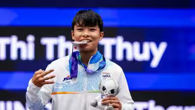 From missing India’s original squad to making history with silver, Roshibina Devi becomes first Indian woman to win three successive Asian Games medals | Asian Games 2026 News From missing India’s original squad to making history with silver, Roshibina Devi becomes first Indian woman to win three successive Asian Games medals | Asian Games 2026 News