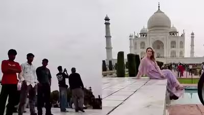 Taj Mahal: Photographer confronts crowd surrounding foreign female tourist at Taj Mahal; video sparks debate on “Civic Sense” Taj Mahal: Photographer confronts crowd surrounding foreign female tourist at Taj Mahal; video sparks debate on “Civic Sense”