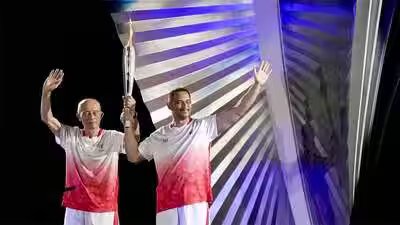 Father-son duo makes history: Five-time Asian Games champion Shigenobu Murofushi and Olympic gold medallist son Koji light cauldron in Aichi-Nagoya | Asian Games 2026 News Father-son duo makes history: Five-time Asian Games champion Shigenobu Murofushi and Olympic gold medallist son Koji light cauldron in Aichi-Nagoya | Asian Games 2026 News