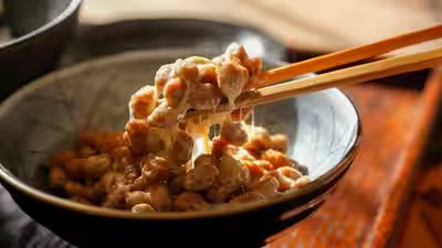 The Japanese food that stretches into sticky threads and has a pungent smell: How fermented soybeans became a breakfast staple The Japanese food that stretches into sticky threads and has a pungent smell: How fermented soybeans became a breakfast staple