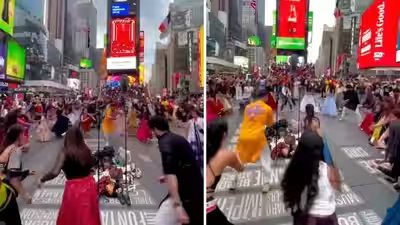 Navratri Garba at New York’s Times Square goes viral; internet divided as users debate Indian celebrations abroad Navratri Garba at New York’s Times Square goes viral; internet divided as users debate Indian celebrations abroad