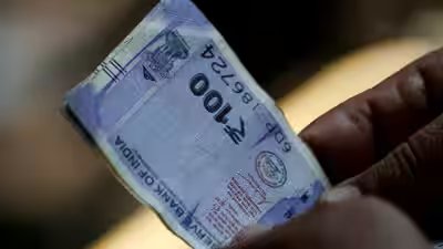 Rupee falls to 96.39 against dollar as oil rises, FII outflows continue Rupee falls to 96.39 against dollar as oil rises, FII outflows continue